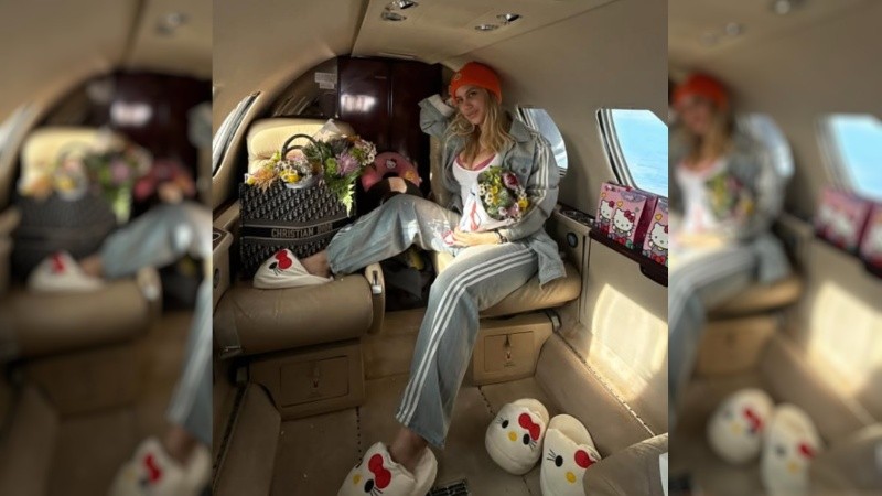Wanda Nara, con vuelo privado y mensajes en el celular.